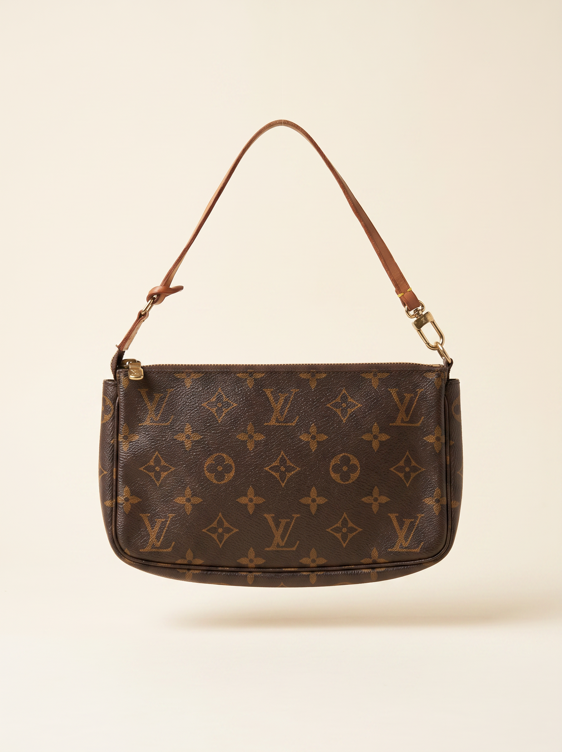 Louis Vuitton Monogram Pochette Accessoires in brown coated canvas with vachetta leather strap